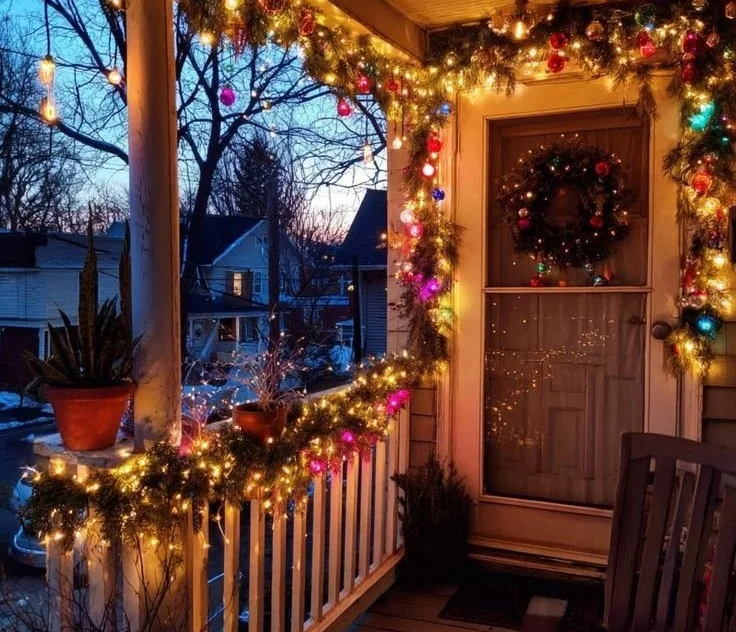 Decorated Christmas balcony with festive lights and ornaments for winter holiday cheer
