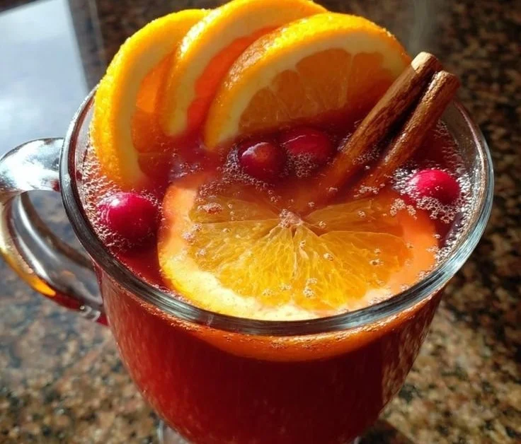 A selection of cozy Christmas holiday drinks in festive glassware.